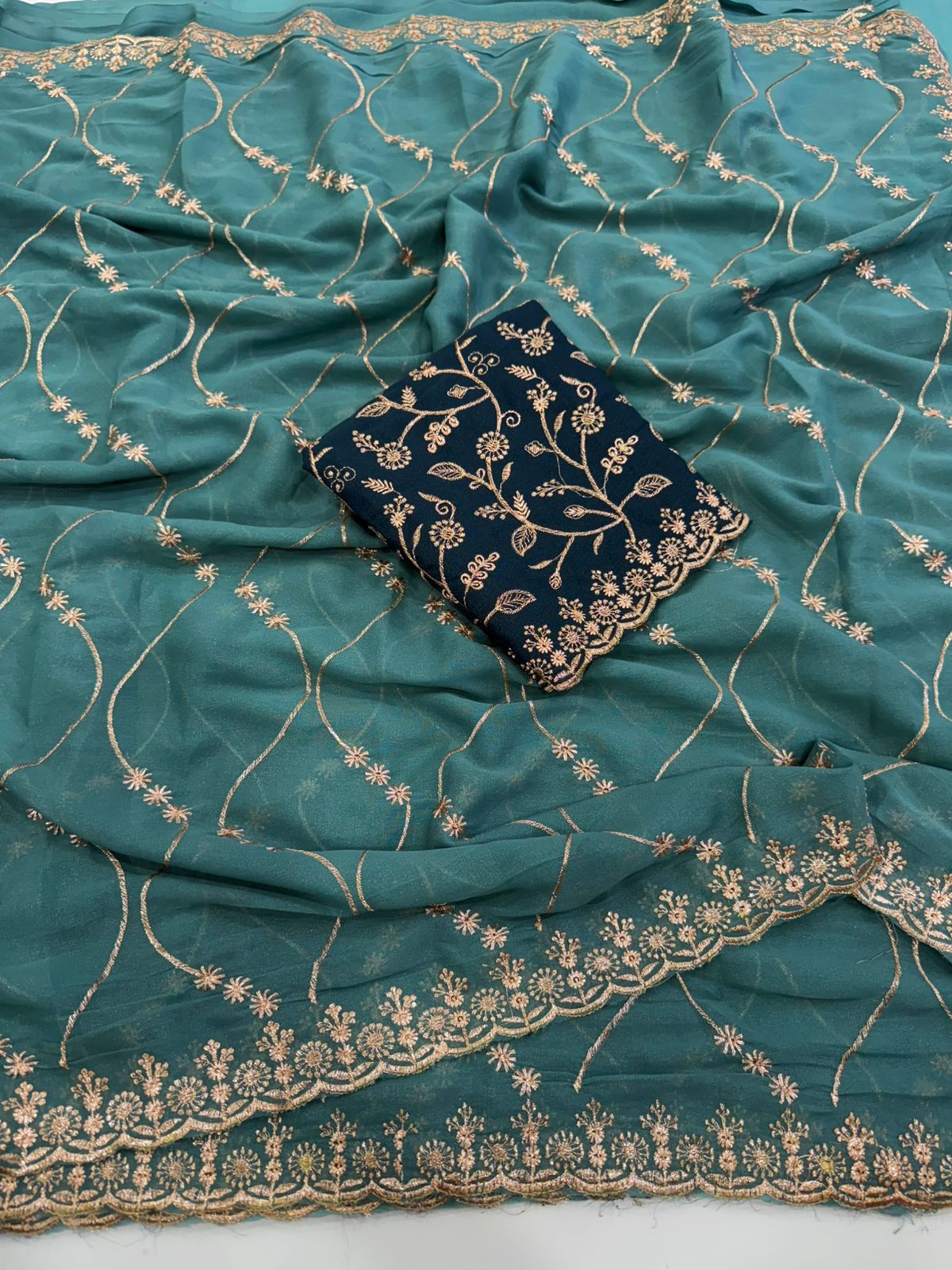 Emerald Grace Georgette Embroidered Saree